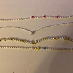 PacSun Necklace Bundle (4) - Yellow Happy Face, Mushroom, Pink Flowers